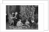 Family christmas photo father two daughters and son with presents and tree by Anonymous