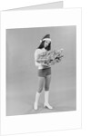 Young woman wearing santa claus hat hot pants go-go boots holding wrapped christmas presents by Anonymous