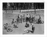 10 neighborhood boys playing sand lot baseball most wear blue jeans tee shirts by Anonymous