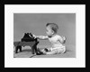 Baby in diaper dialing telephone by Anonymous