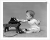Baby in diaper dialing telephone by Anonymous
