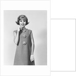 Smiling stylish young woman wearing sack dress gloves by Anonymous