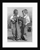 Boys in striped overalls holding piglet by Anonymous