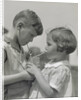 Children boy girl sharing drinking glass using straws by Anonymous