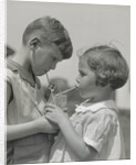 Children boy girl sharing drinking glass using straws by Anonymous