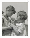 Children boy girl sharing drinking glass using straws by Anonymous