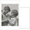 Children boy girl sharing drinking glass using straws by Anonymous
