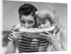 Teen age boy & girl eating slice watermelon by Anonymous