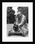 Elderly man in yard kneeling down to fix lawnmower by Anonymous