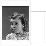 Portrait brunette little girl with surprised amazed facial expression by Anonymous