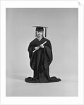 Girl wearing graduation cap gown holding diploma by Anonymous