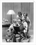 Father reading to family in chair by Anonymous