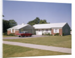 Suburban brick home with car driveway near dayton ohio by Anonymous