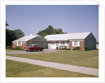 Suburban brick home with car driveway near dayton ohio by Anonymous