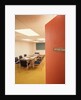 Conference room interior with table chairs chalkboard open door ajar by Anonymous