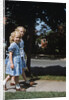 Two blond girls wearing blue dresses on the first day of school by Anonymous