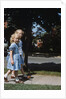 Two blond girls wearing blue dresses on the first day of school by Anonymous