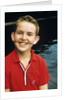 Portrait young boy in red shirt smiling by Anonymous