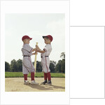 Two boys holding baseball bat little league uniforms by Anonymous