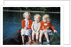 Boy and two girls in red sweaters sitting in back of rowboat by Anonymous