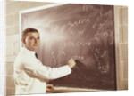 Science professor writing a formula for chelating agent on chalkboard by Anonymous