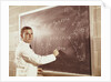 Science professor writing a formula for chelating agent on chalkboard by Anonymous