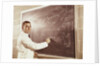 Science professor writing a formula for chelating agent on chalkboard by Anonymous