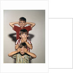 Boys posing as three wise monkeys see no evil hear no evil speak no evil by Anonymous