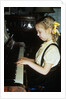 Little blond girl playing practicing the piano by Anonymous