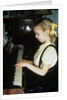 Little blond girl playing practicing the piano by Anonymous