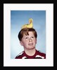 Boy with baby duckling sitting on top of his head by Anonymous