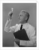 Man scientist studying test tube by Anonymous