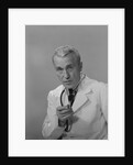 Male doctor holding stethoscope by Anonymous