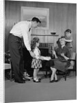Family living room woman mother getting surprise gift from children daughter son husband by Anonymous