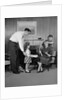 Family living room woman mother getting surprise gift from children daughter son husband by Anonymous