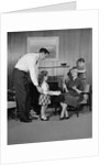 Family living room woman mother getting surprise gift from children daughter son husband by Anonymous