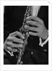 Male hands playing clarinet by Anonymous