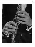 Male hands playing clarinet by Anonymous