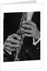 Male hands playing clarinet by Anonymous