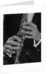Male hands playing clarinet by Anonymous