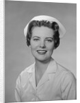 Portrait female nurse smiling by Anonymous