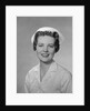 Portrait female nurse smiling by Anonymous