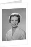 Portrait female nurse smiling by Anonymous
