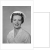 Portrait female nurse smiling by Anonymous