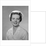 Portrait female nurse smiling by Anonymous
