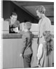 Mother two children boy handing banking deposit to male bank teller by Anonymous
