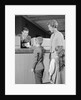 Mother two children boy handing banking deposit to male bank teller by Anonymous