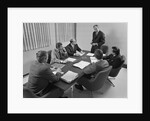 6 executive businessmen around conference table board meeting by Anonymous