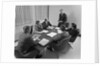 6 executive businessmen around conference table board meeting by Anonymous