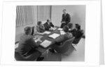 6 executive businessmen around conference table board meeting by Anonymous
